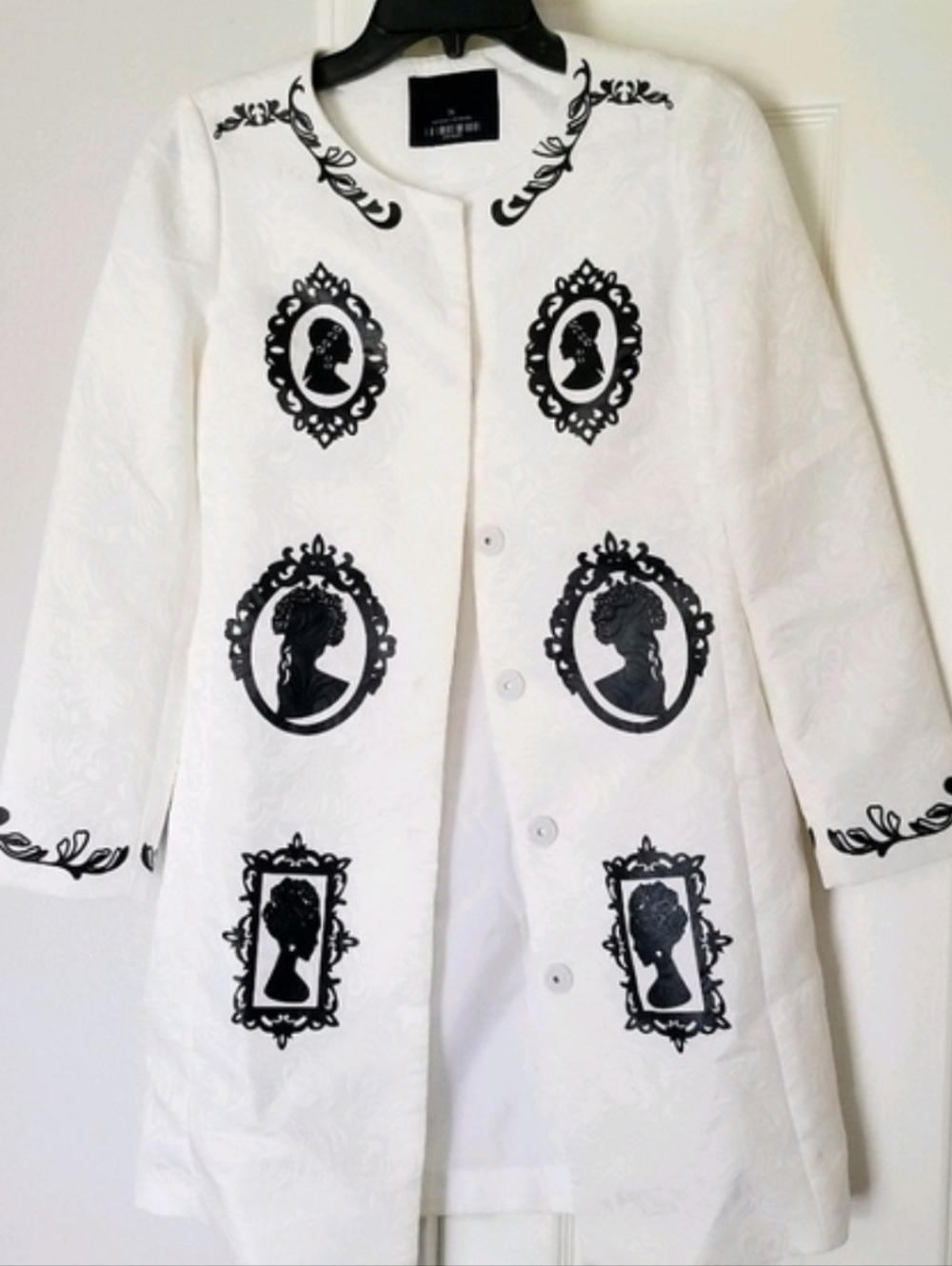 White Embroidered Jacquard Appliqué Cameo Overcoat with Black Motifs